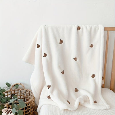 couverture bebe bearly sur chaise