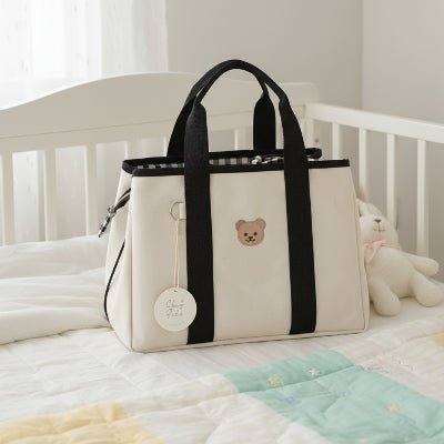 sac a langer bjorn noir dans lit