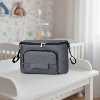 sac a langer siam modele gris sur table  a langer